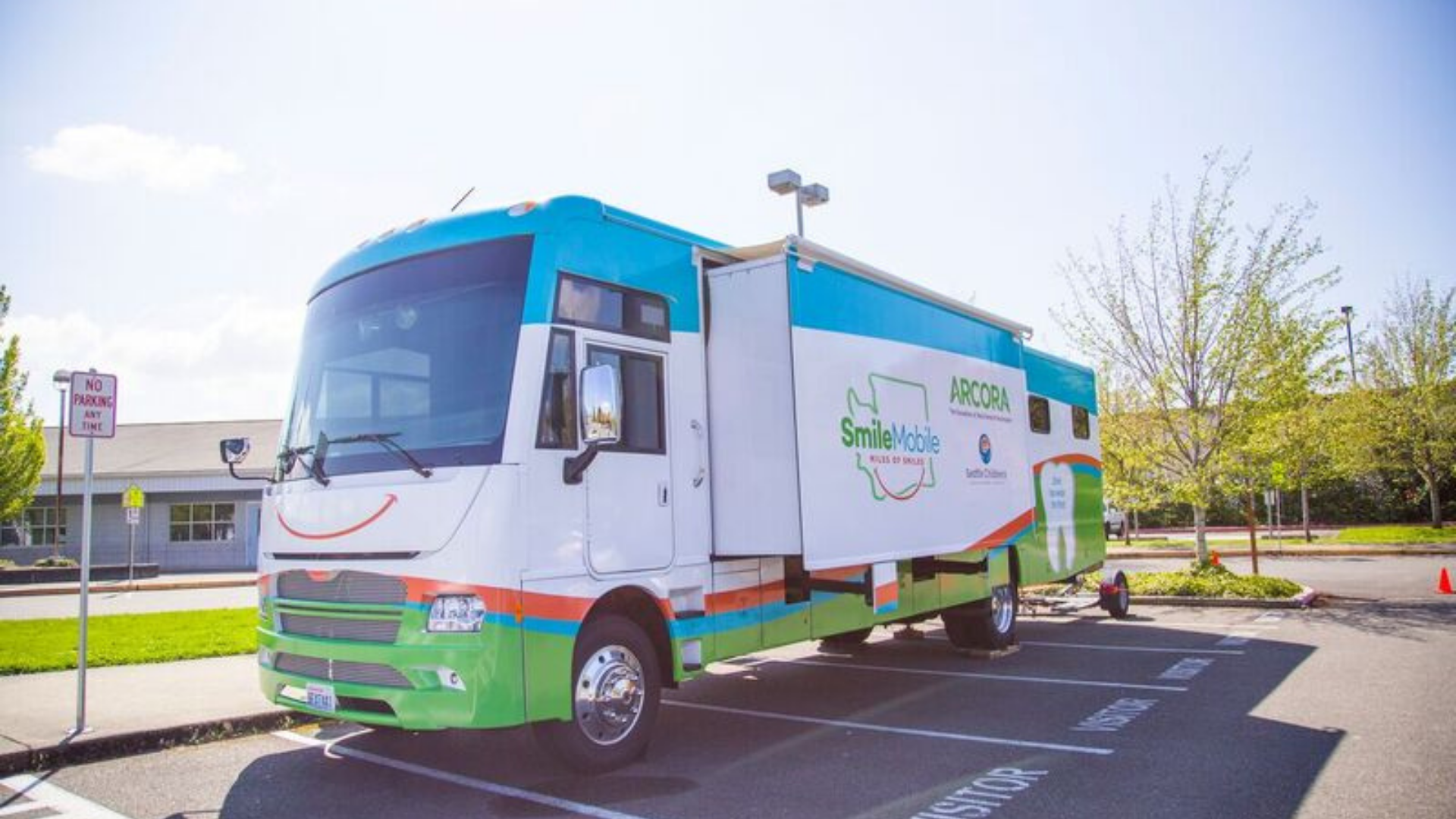 SmileMobile outside local clinic to provide dental care access to Medicaid children